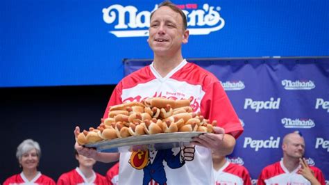 Joey Chestnut eats 62 hot dogs for 16th Nathan’s hot dog eating contest title, while Miki Sudo named women’s champion